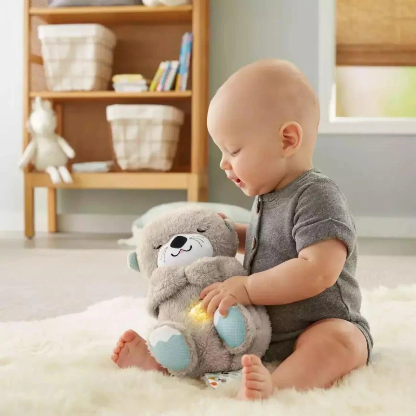 Peluche relajante para bebé que simula respiracion ( nutria gris )